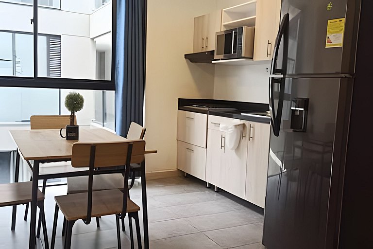 Condo centrico/ cama Queen/ Wi-Fi