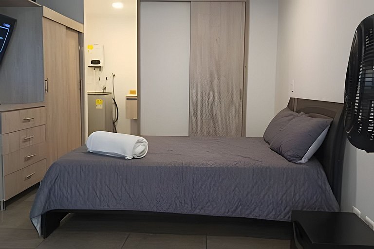 Condo centrico/ cama Queen/ Wi-Fi