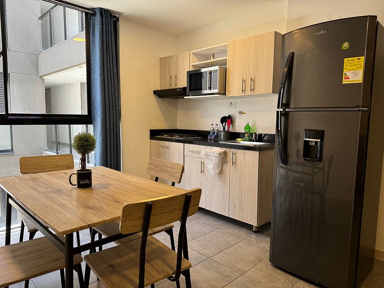 Condo centrico/ cama Queen/ Wi-Fi