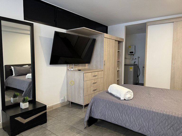 Condo centrico/ cama Queen/ Wi-Fi