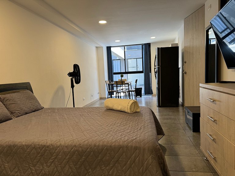 Condo centrico/ cama Queen/ Wi-Fi