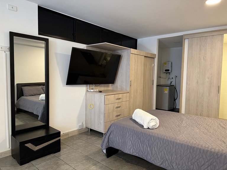 Condo centrico/ cama Queen/ Wi-Fi