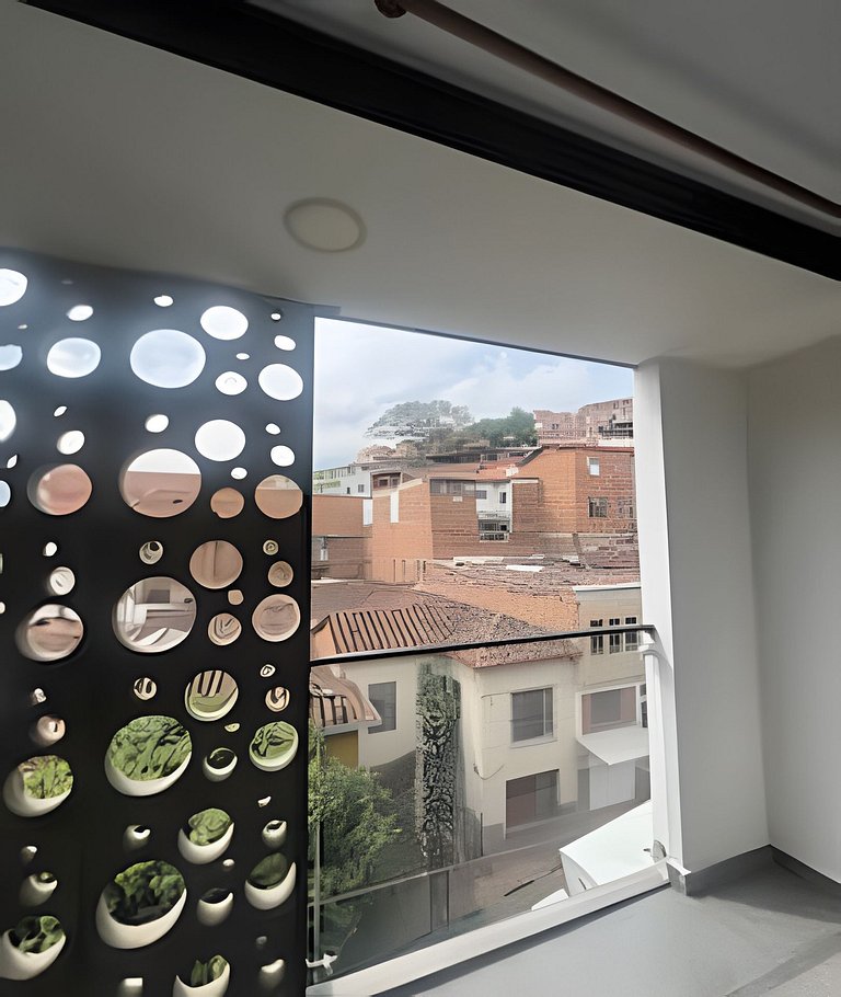 Cómodo y central loft con balcón