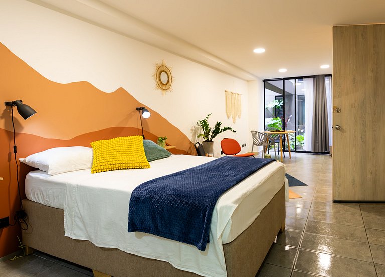 Loft con 2 camas y vista al jardín