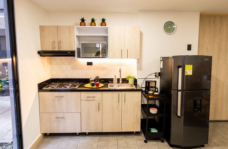 Loft con 2 camas y vista al jardín