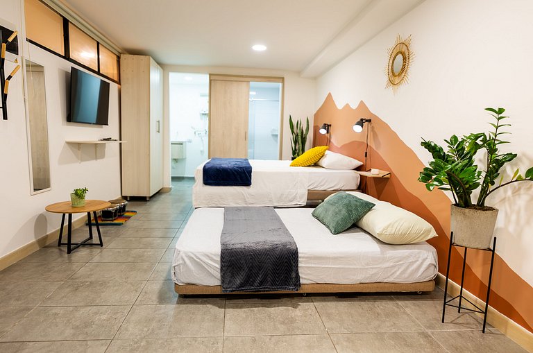 Loft con 2 camas y vista al jardín