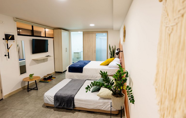 Loft con 2 camas y vista al jardín