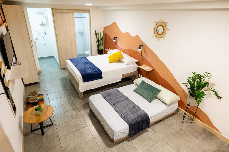 Loft con 2 camas y vista al jardín
