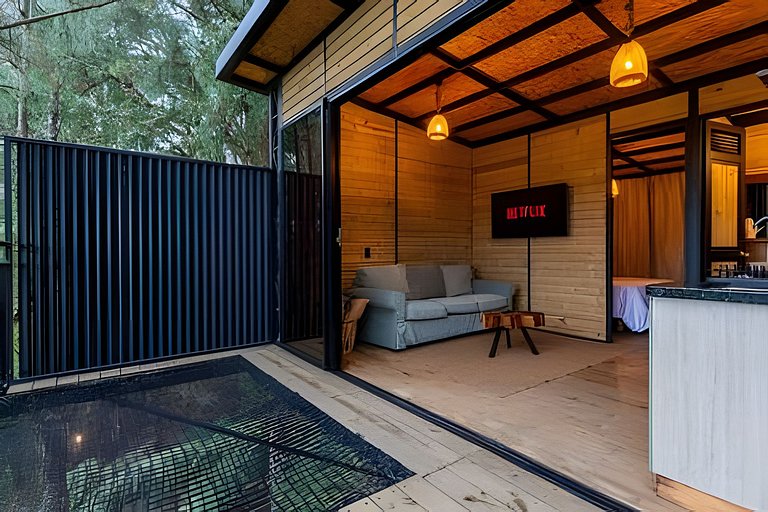 Cabaña en el bosque con jacuzzi y vista al embalse