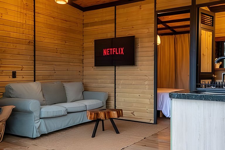 Cabaña en el bosque con jacuzzi y vista al embalse